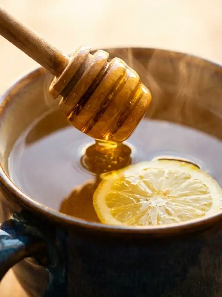 Japanese Honey Trick: The Best Fast Morning Drink 5 Stirring raw honey and lemon for the Japanese honey trick.